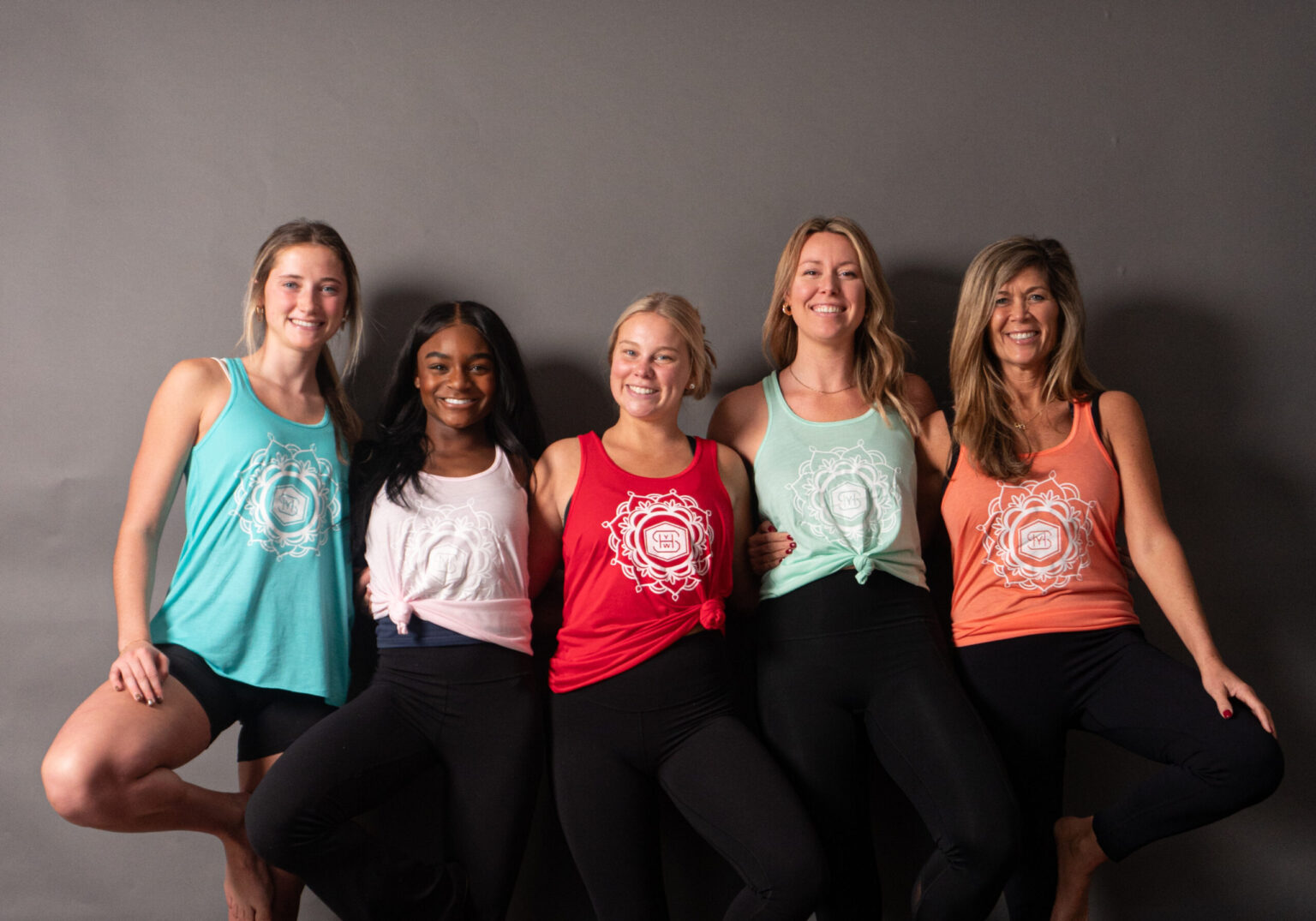 Members of the Sterling Hot Yoga community smiling together